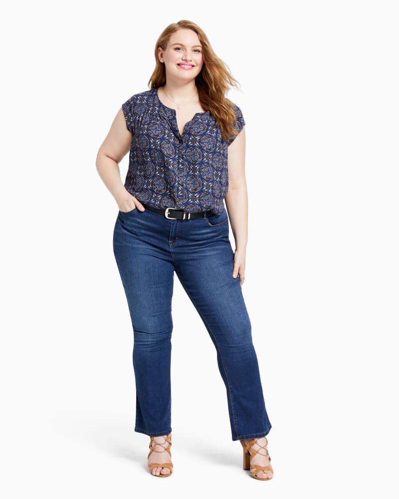 Plus size model with hourglass body shape wearing Grand Bootcut Jean  by Meri Skye | Dia&Co | dia_product_style_image_id:111818